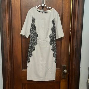 Limited Size 0 gray sheath dress w black lace on sides. The Scandal collection.